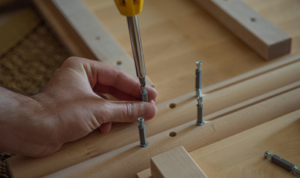 How can tightening loose screws on handles and hinges extend their life