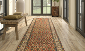 How can using runners in long corridors protect the main flooring underneath