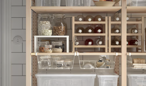 How can using transparent containers in open shelves change how you store things