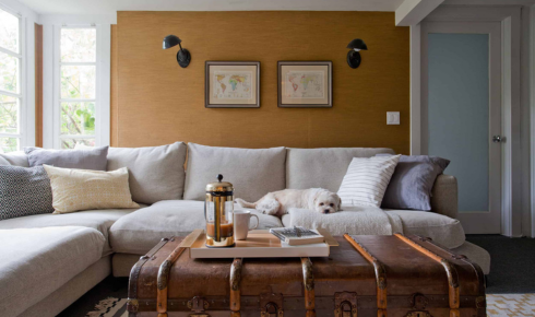Why should you consider how much natural light a room gets before choosing darker paints